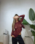 Maglia pizzo asimmetrica