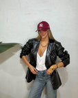 Blazer strutturato pitonato lucido