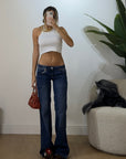 Jeans vita bassa a zampa